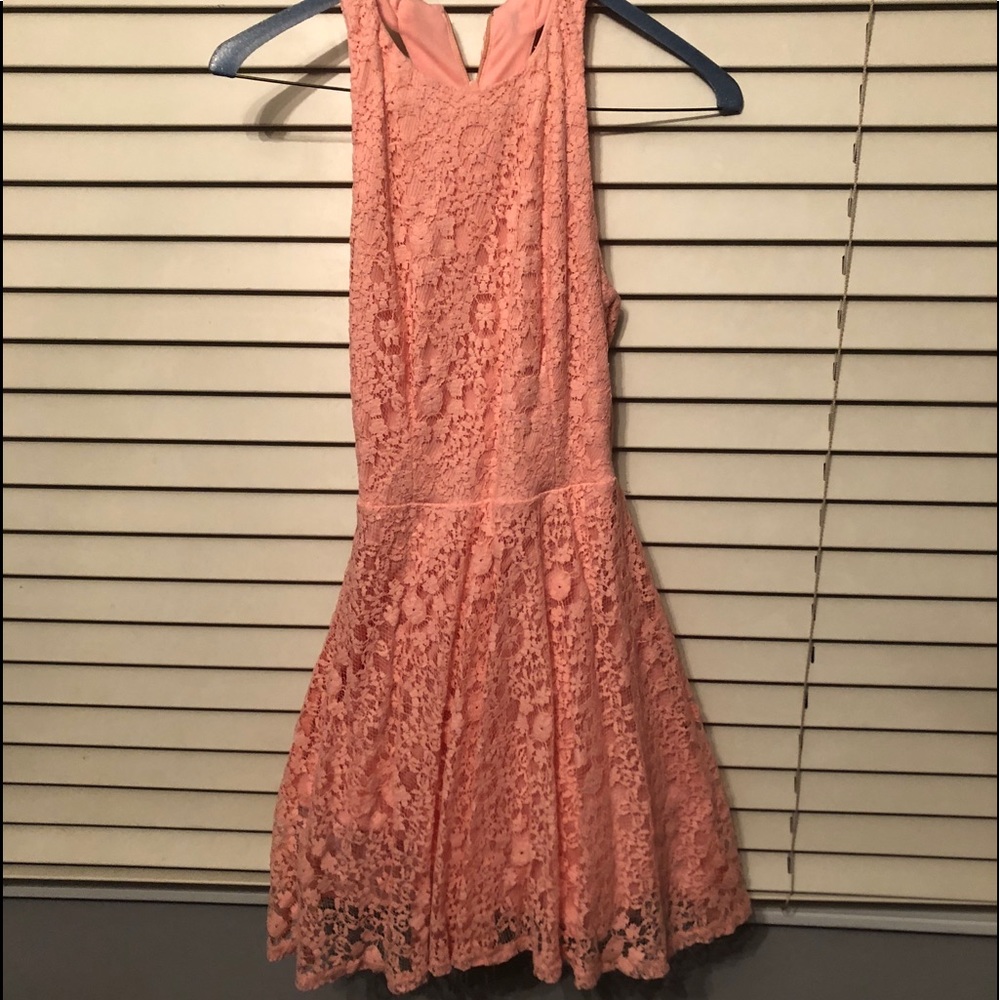 Pink lacy dress with back cut outs